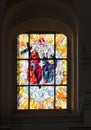 CheÃâm, Poland, June 8, 2022: Stained glass window in the window of the church, the shrine of the Mother of God in CheÃâm in